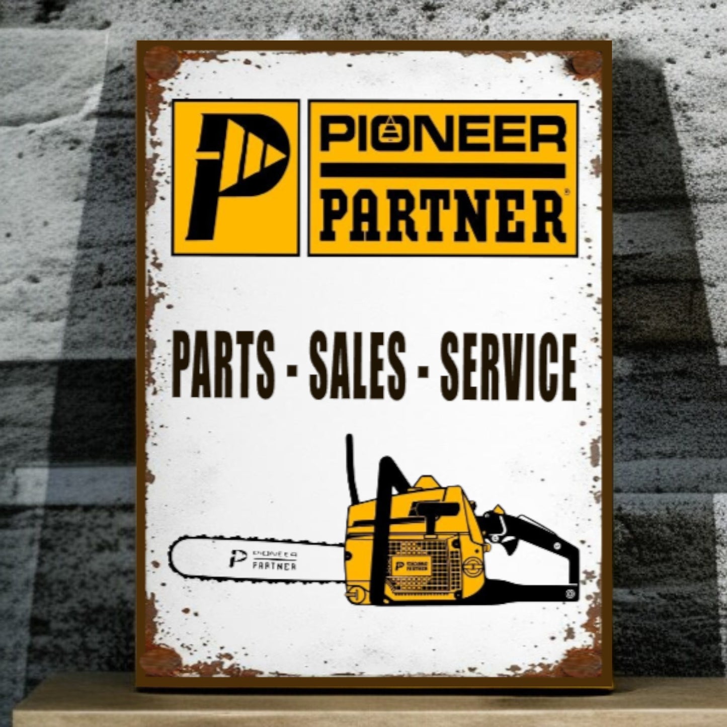 Vintage-style sign for Pioneer Partner with a chainsaw illustration on a textured background