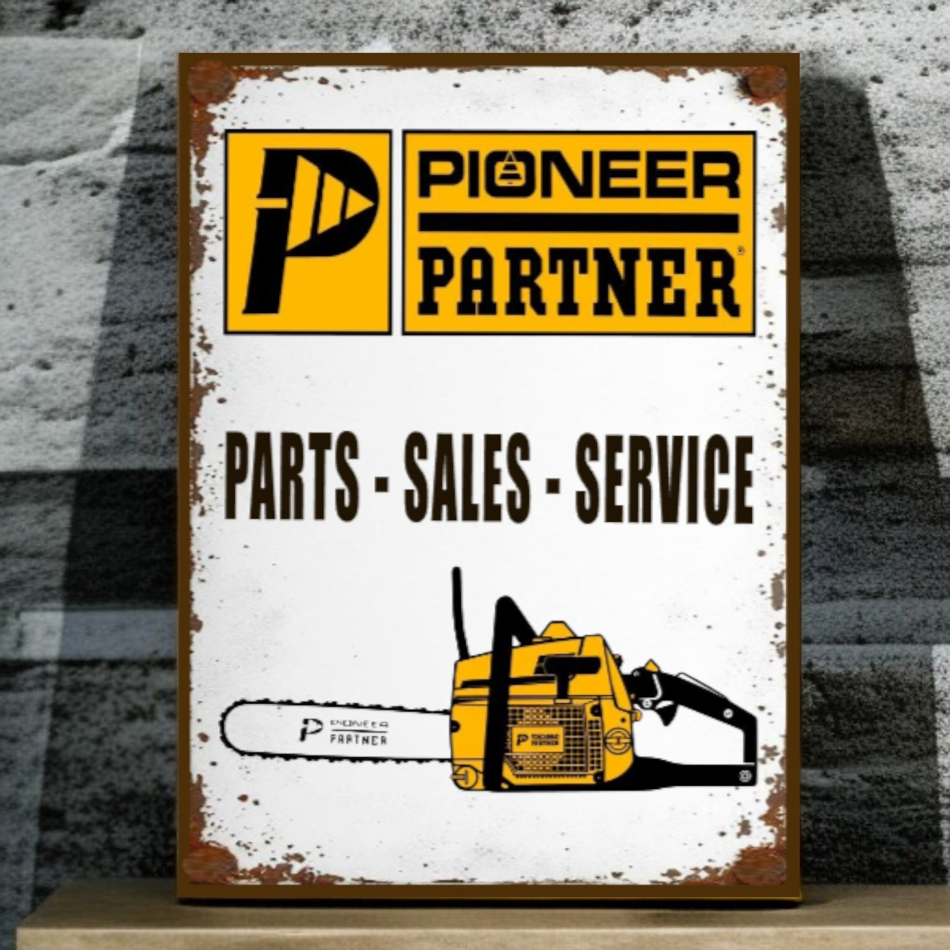 Vintage-style sign for Pioneer Partner with a chainsaw illustration on a textured background