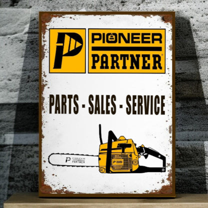 Vintage-style sign for Pioneer Partner with a chainsaw illustration on a textured background