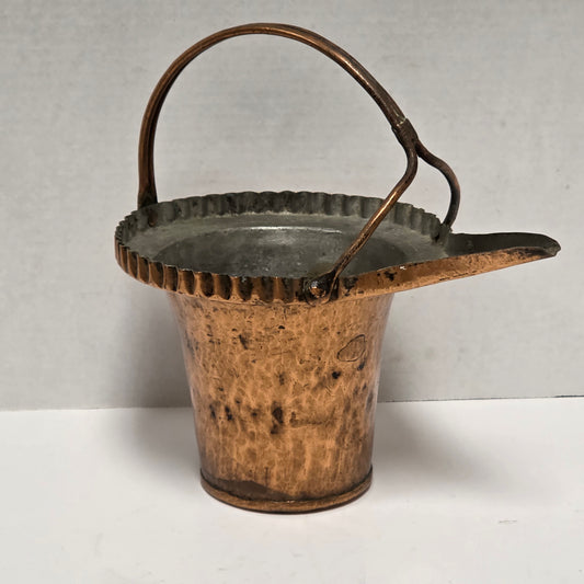 Remarkable primitive hand-forged copper vessel
