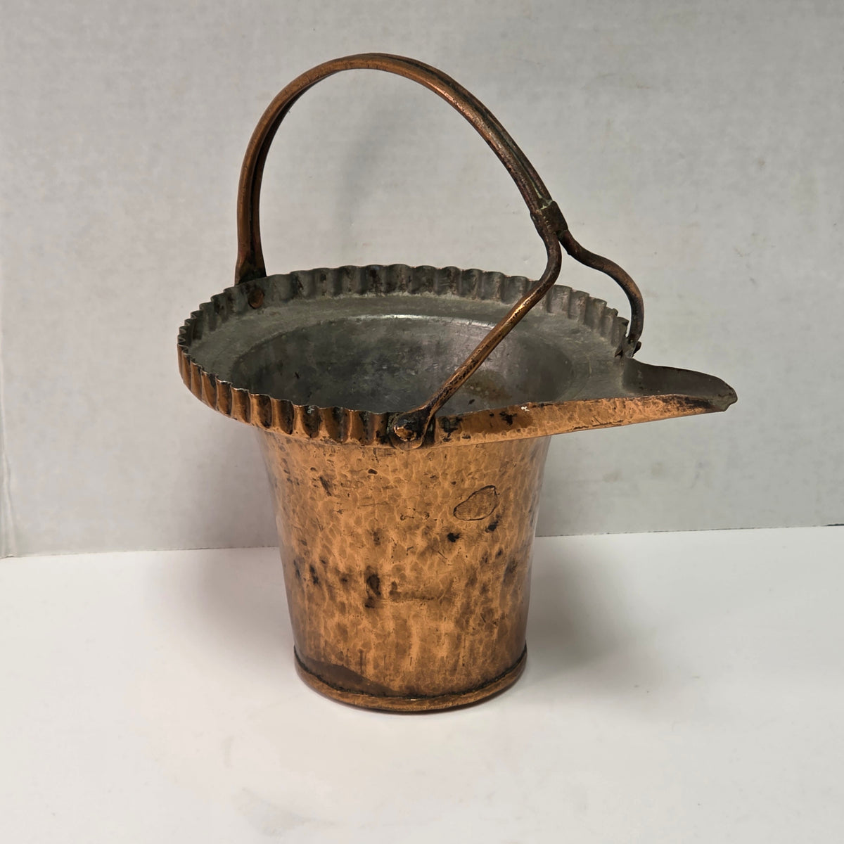 Remarkable primitive hand-forged copper vessel
