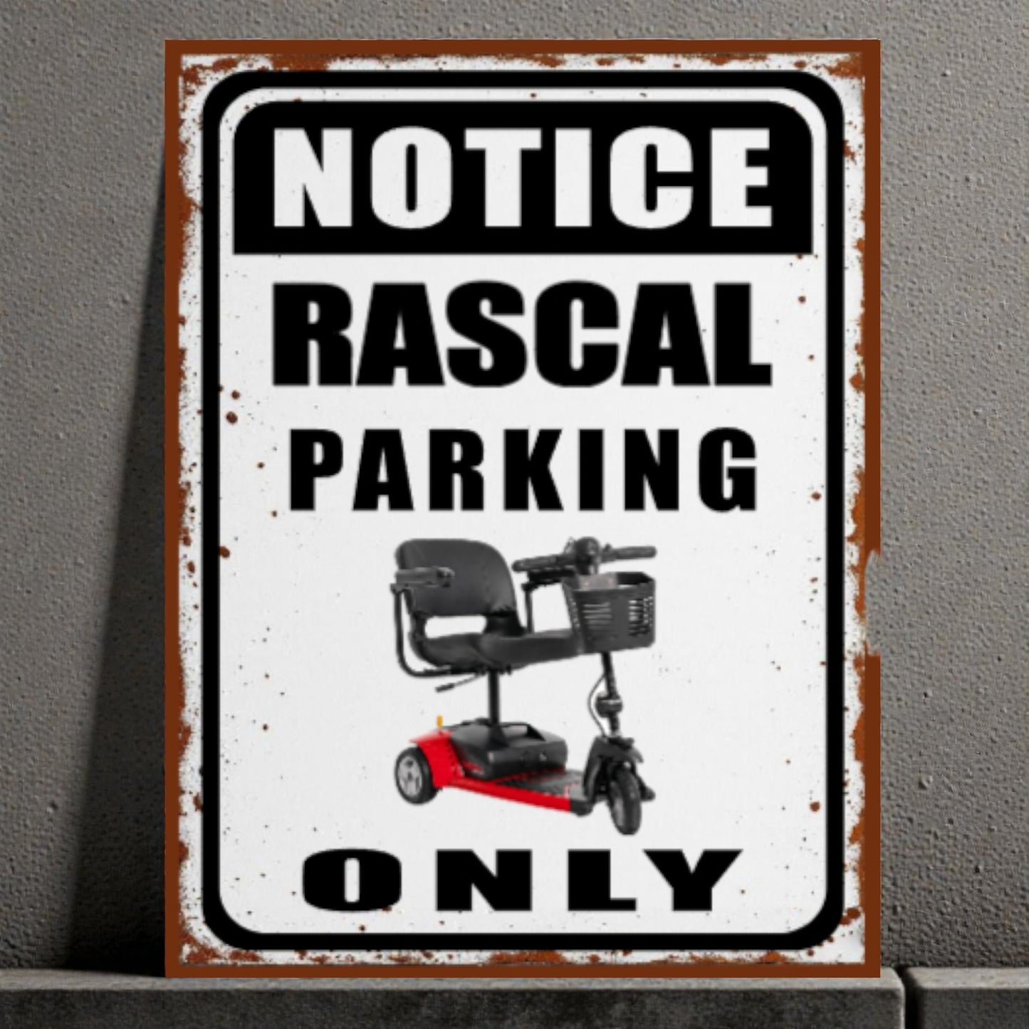 Metal sign with a scooter and text 'Notice Rascal Parking Only' on a gray background