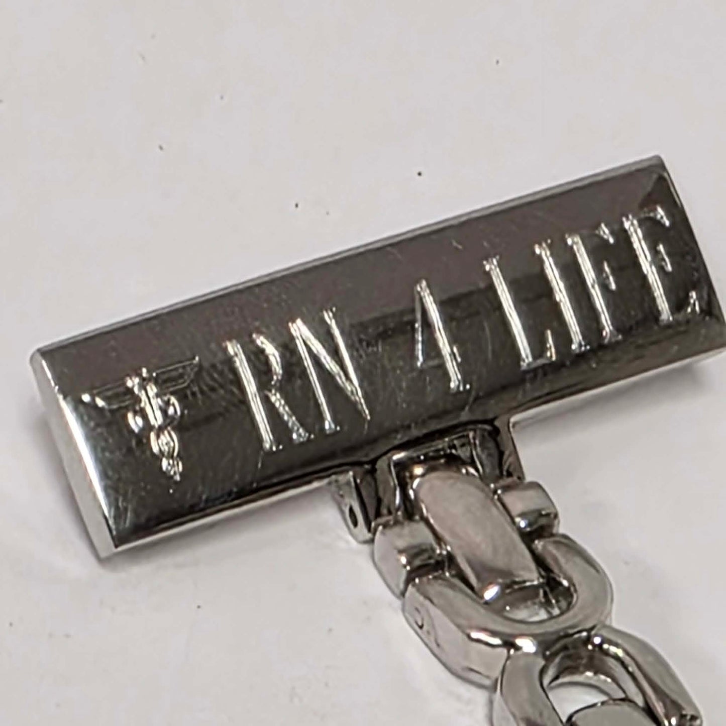 RN for Life pin-on nurse lapel watch in excellent condition.
