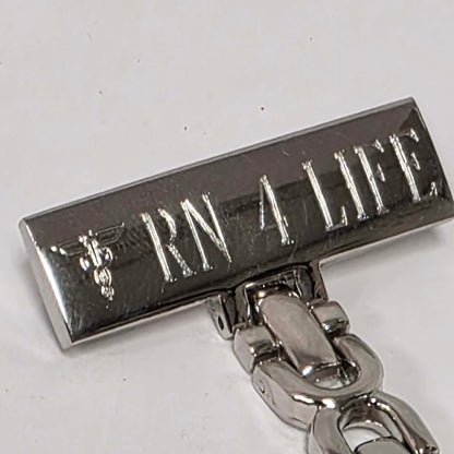 RN for Life pin-on nurse lapel watch in excellent condition.

