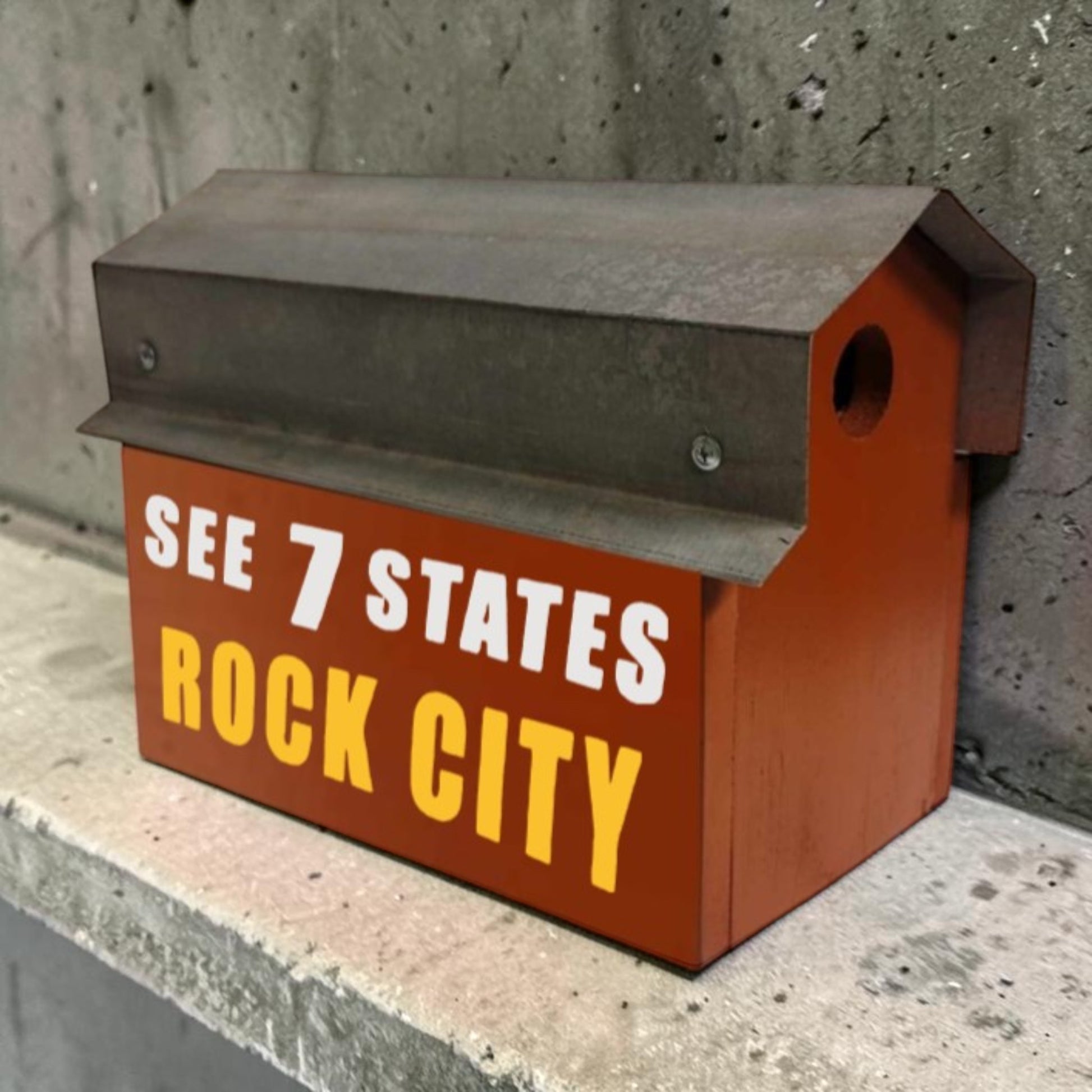 Red reclaimed barn tin Rock City double birdhouse with “See 7 States” hand lettering and two nesting compartments.