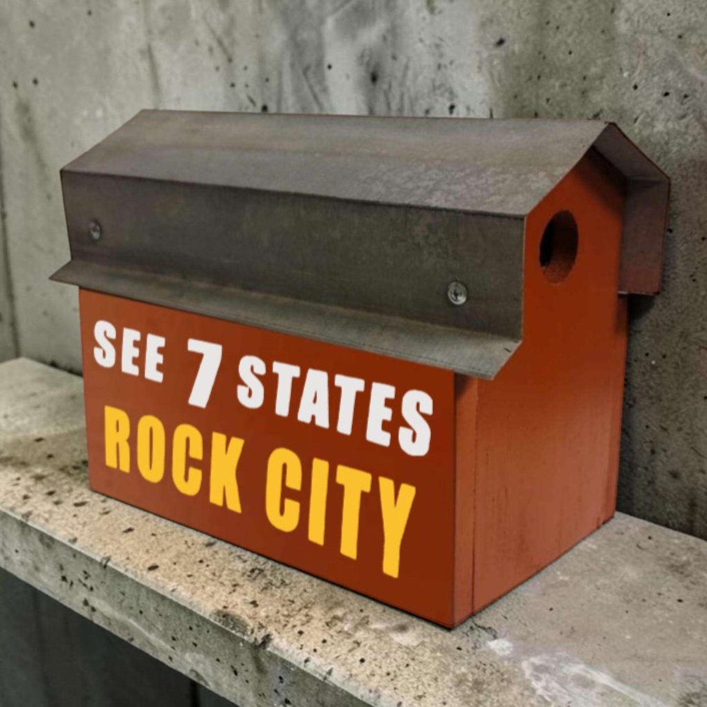 Red reclaimed barn tin Rock City double birdhouse with “See 7 States” hand lettering and two nesting compartments.