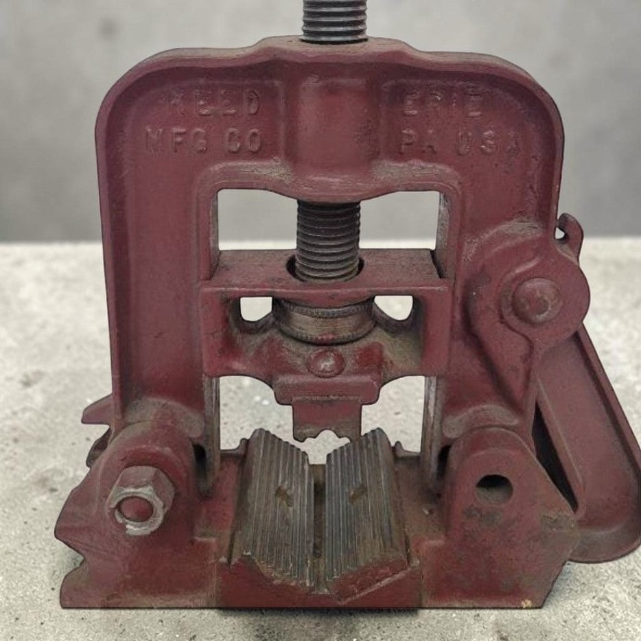 Vintage Reed No. 1 portable pipe vise for plumbing and workshop use.
