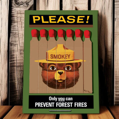 Smokey Bear poster with matches on a wooden background