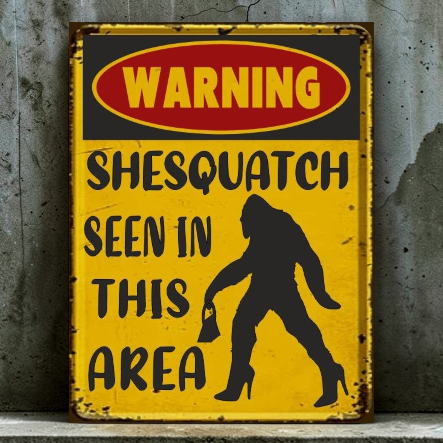 Vintage-style metal sign with a warning about 'Shesquatch' seen in the area on a textured wall background.