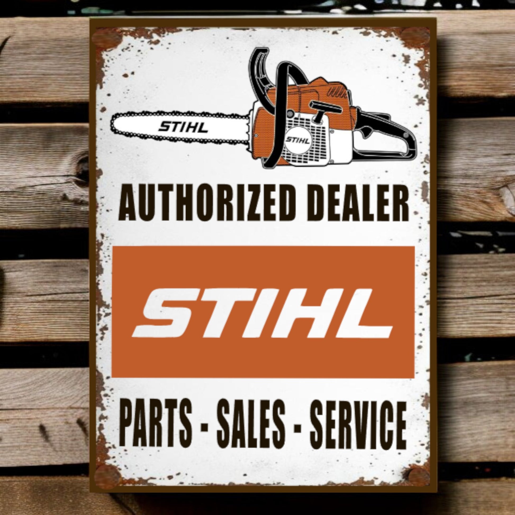 Stihl authorized dealer sign with chainsaw graphic on a wooden background