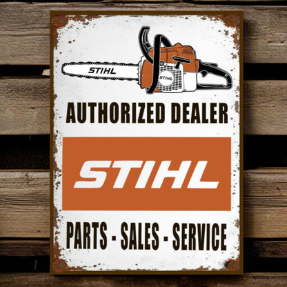 Stihl authorized dealer sign with chainsaw graphic on a wooden background