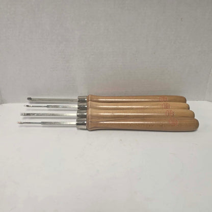 A rare vintage ShopSmith woodturning chisel set in excellent condition, featuring four specialty turning tools.