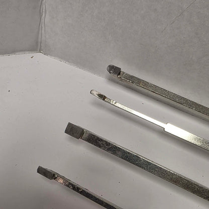 A rare vintage ShopSmith woodturning chisel set in excellent condition, featuring four specialty turning tools.