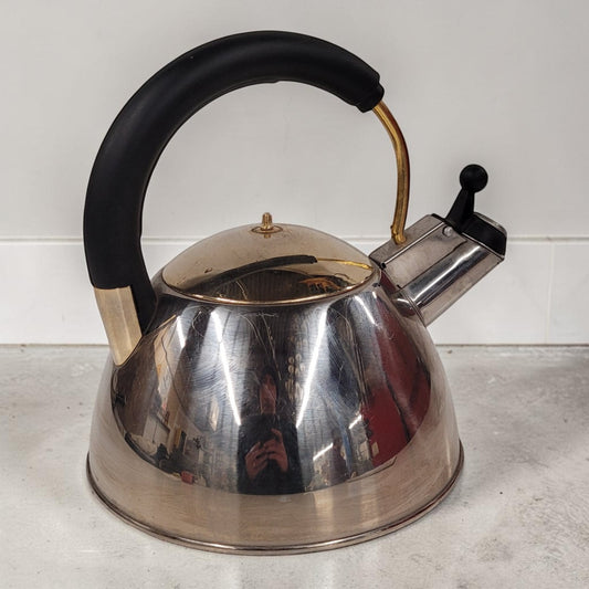 Vintage Josef Strauss Symphony stainless steel whistling tea kettle with mid-century modern design.
