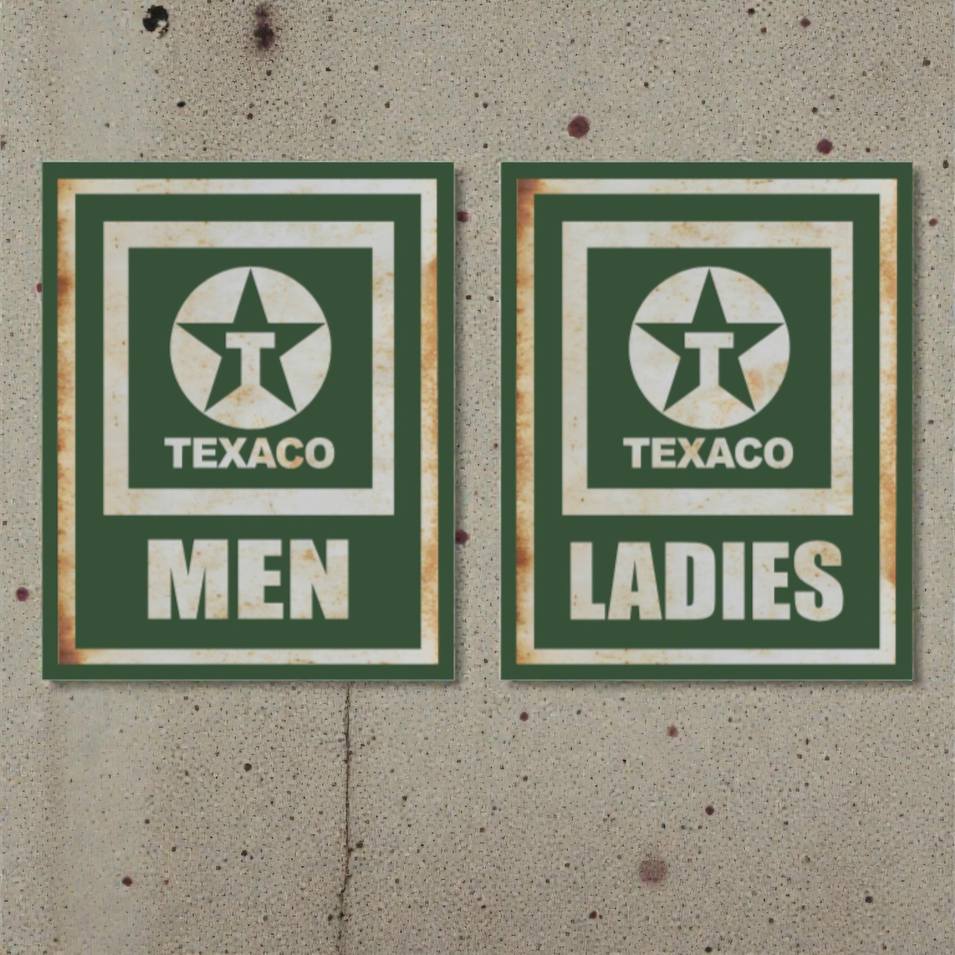 Two vintage Texaco restroom signs on a textured wall.