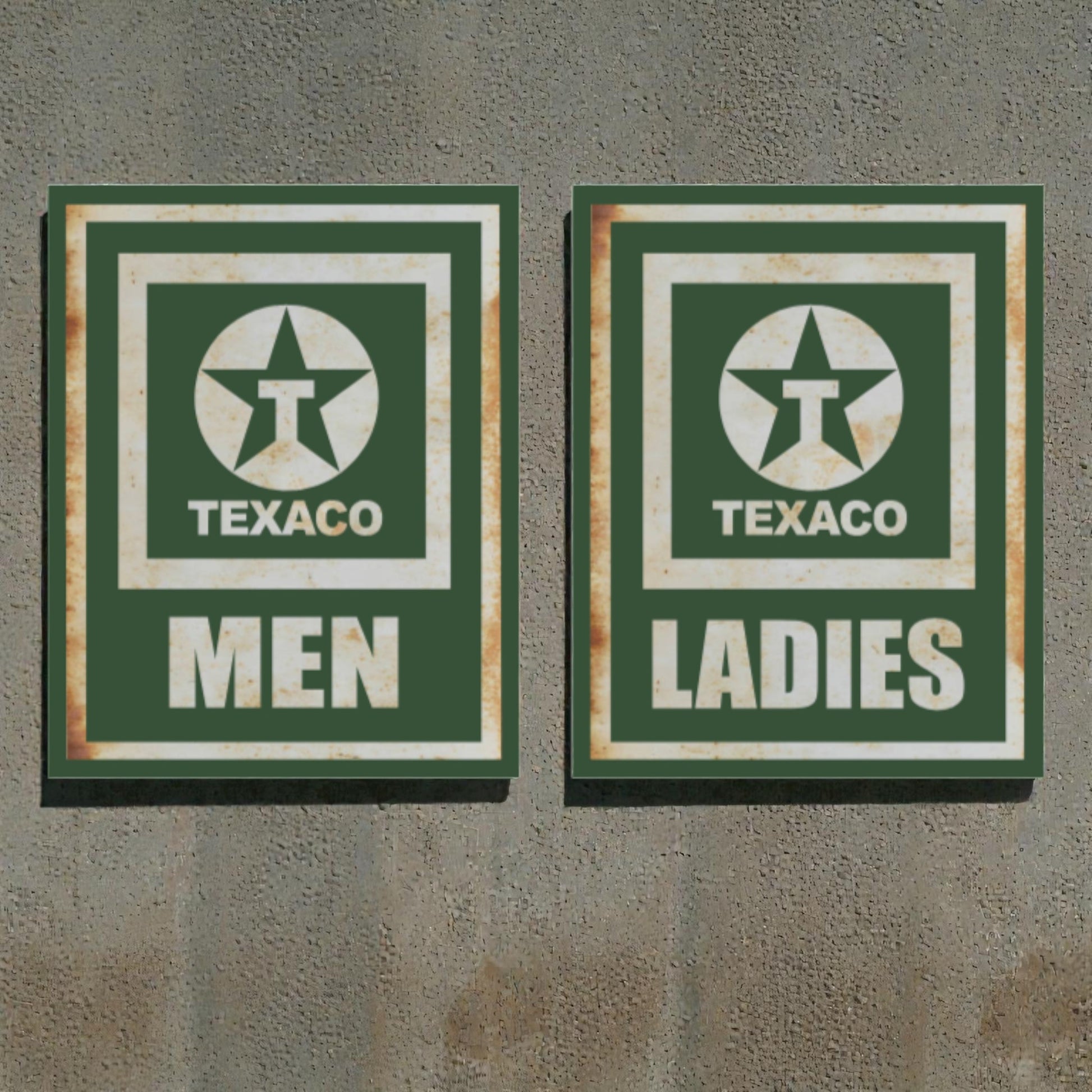Two vintage-style Texaco restroom signs on a textured wall.