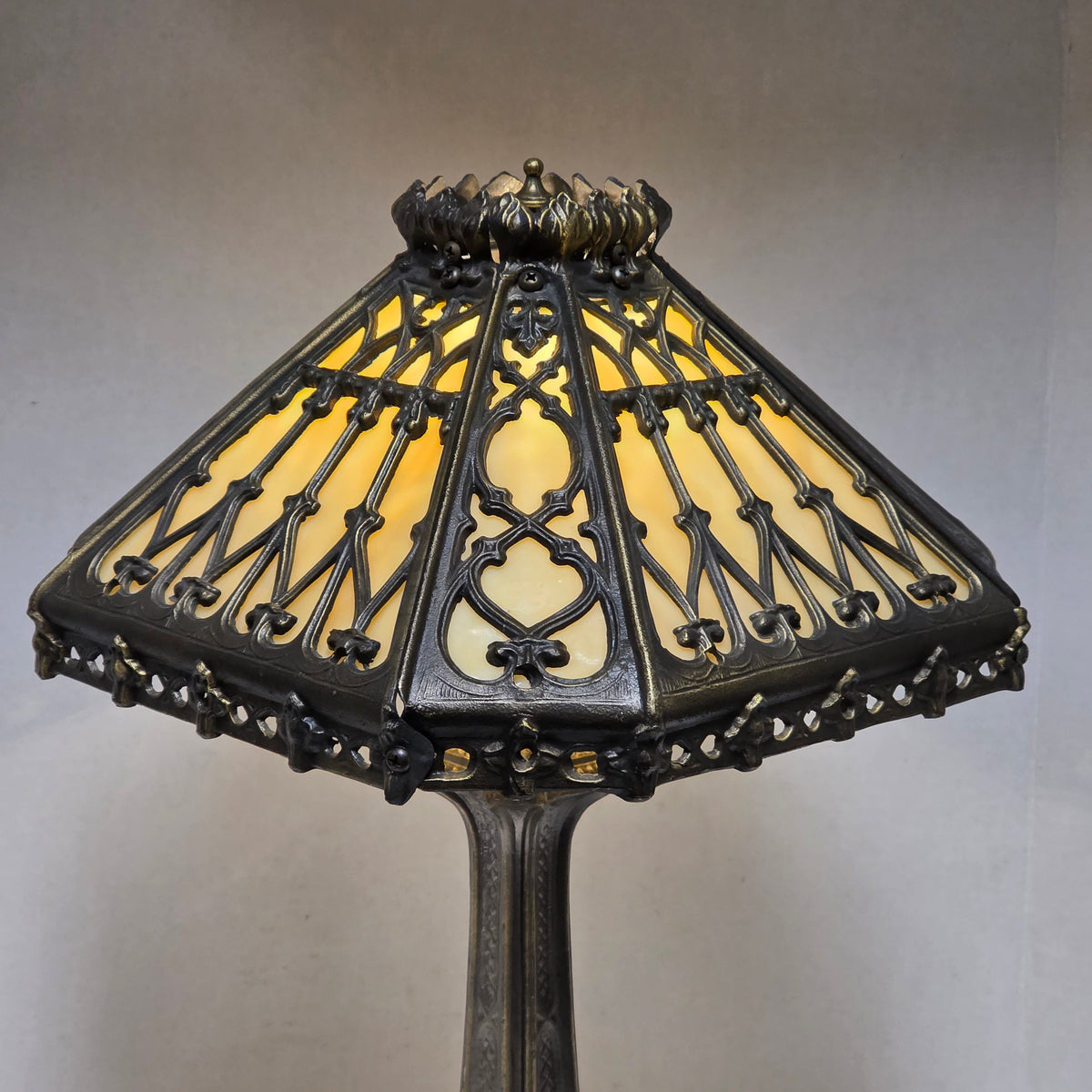 Timeless Victorian elegance in bronze and slag glass.