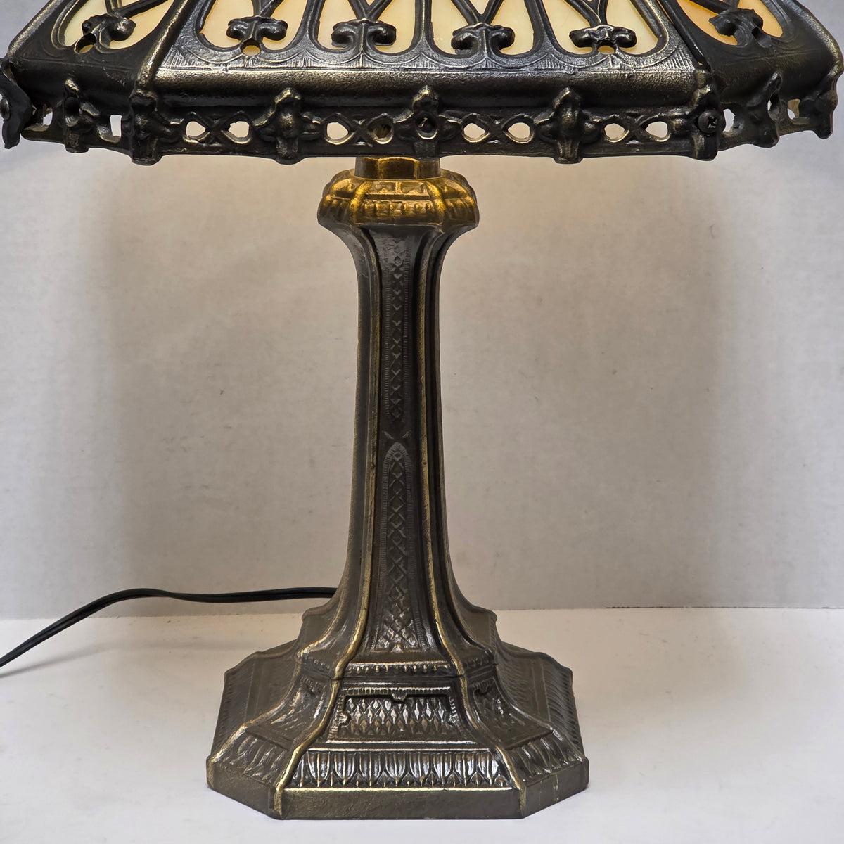 Timeless Victorian elegance in bronze and slag glass.