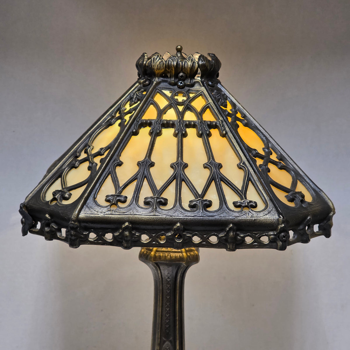 Timeless Victorian elegance in bronze and slag glass.