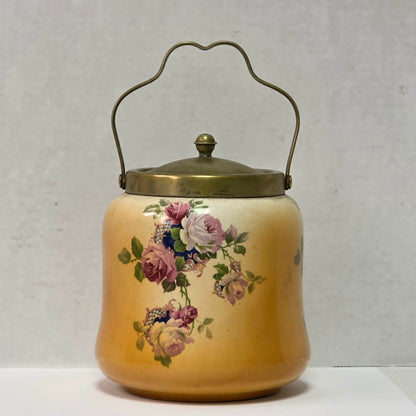Victorian porcelain biscuit barrel with beautiful rose motif and antique crazing.
