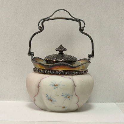 Victorian Mount Washington biscuit barrel with pastel pink and blue floral glass and ornate handle.
