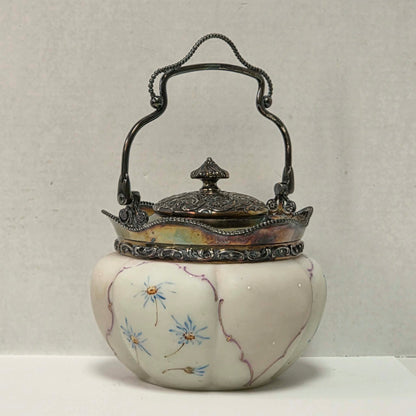 Victorian Mount Washington biscuit barrel with pastel pink and blue floral glass and ornate handle.
