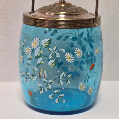 Victorian pastel blue glass biscuit barrel with hand-painted flowers, butterflies and bees.
