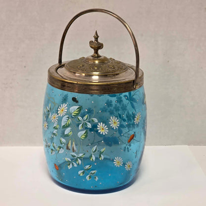Victorian pastel blue glass biscuit barrel with hand-painted flowers, butterflies and bees.
