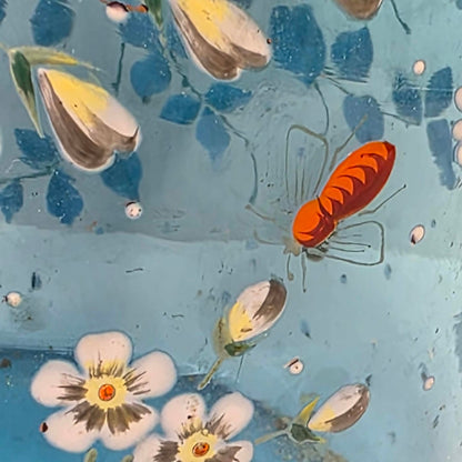 Victorian pastel blue glass biscuit barrel with hand-painted flowers, butterflies and bees.
