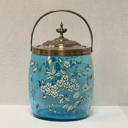 Victorian pastel blue glass biscuit barrel with hand-painted flowers, butterflies and bees.
