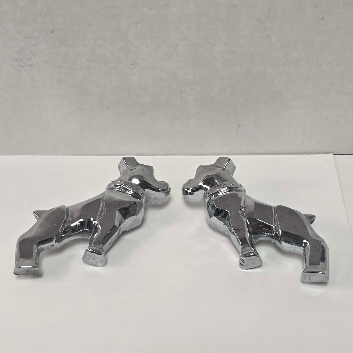 Pair of original vintage Mack truck chrome fender emblems in excellent used condition.
