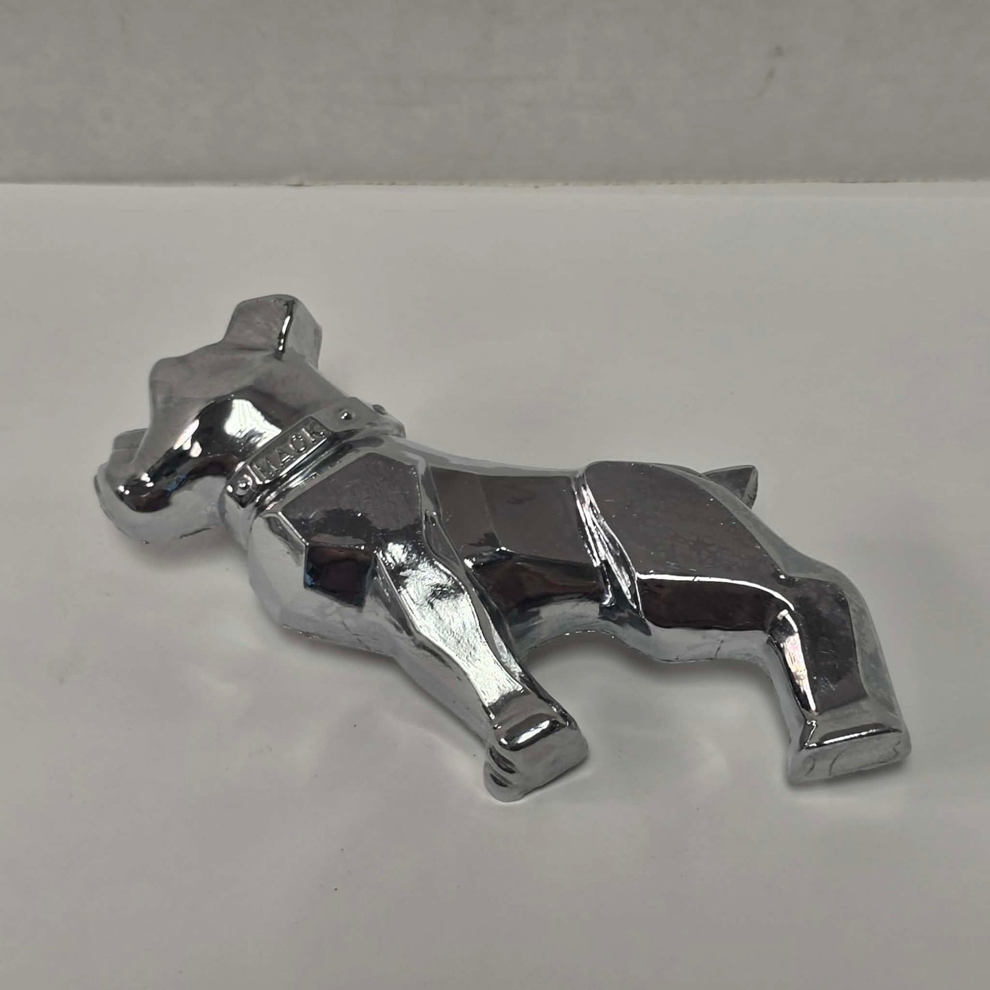 Pair of original vintage Mack truck chrome fender emblems in excellent used condition.
