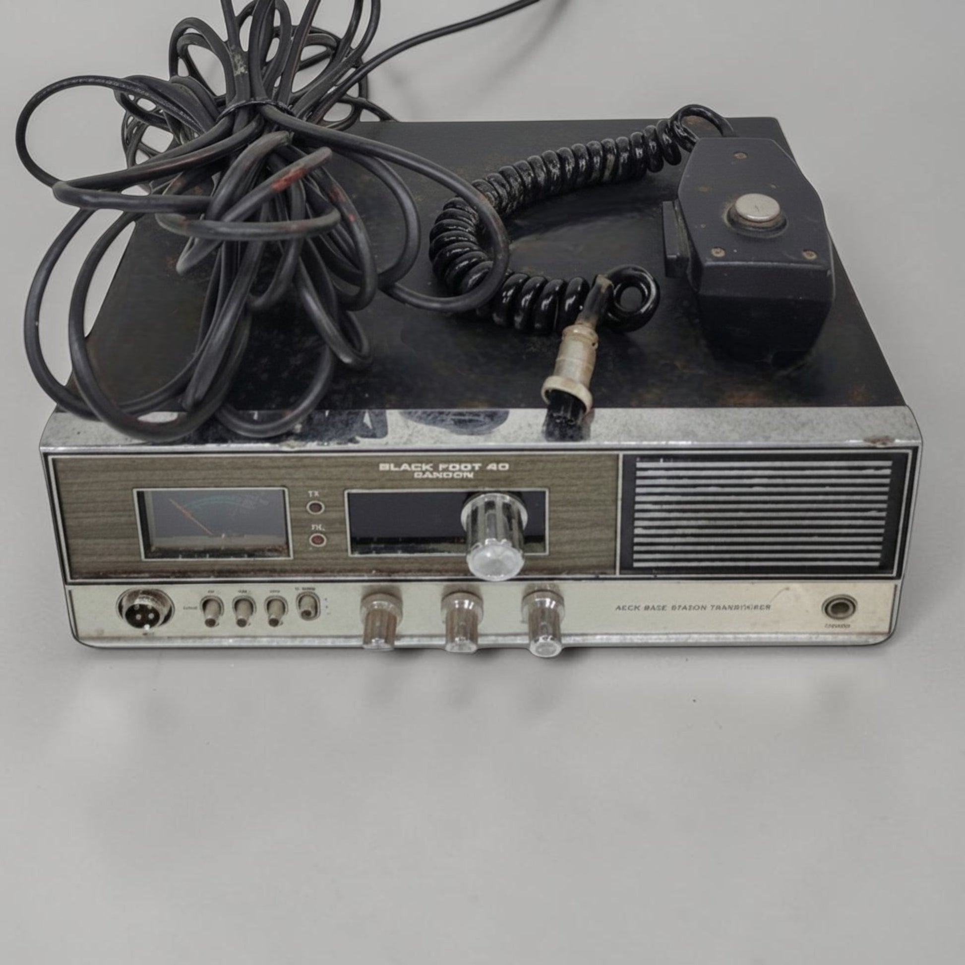 Vintage Blackfoot 40 CB base station transceiver with corded microphone handset.

Suggested Price