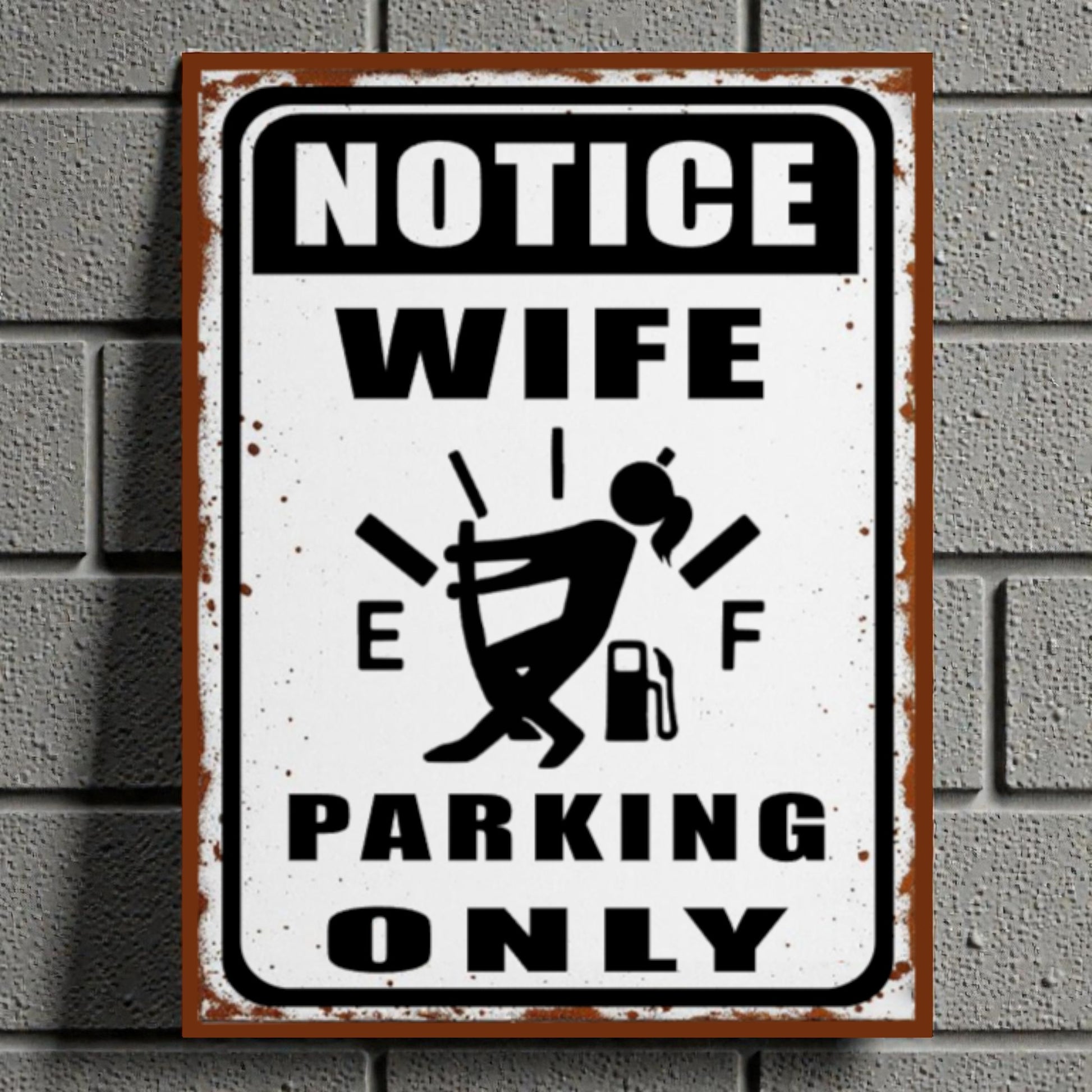 Metal sign with humorous design on a brick wall background