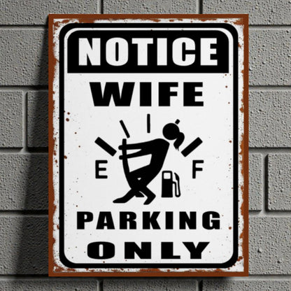 Metal sign with humorous design on a brick wall background