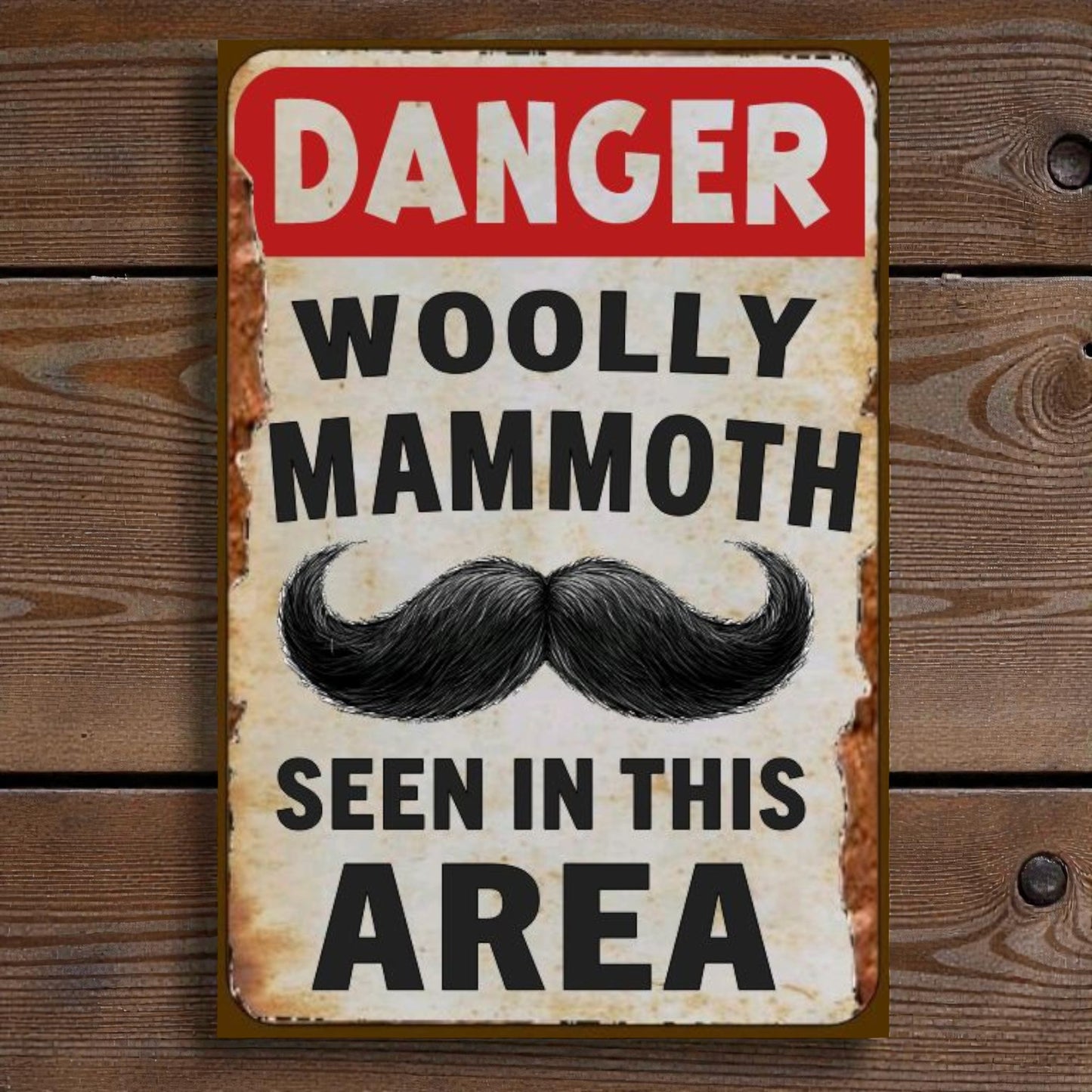 Vintage-style sign with a mustache graphic and text on a wooden background