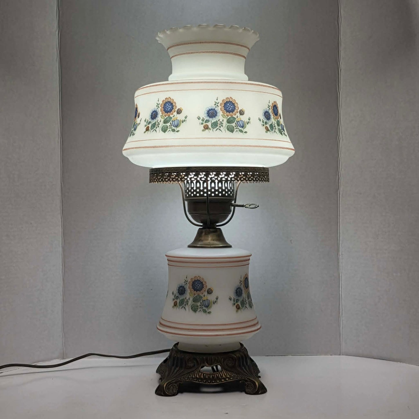 Vintage Abigail Adams style hurricane lamp with blue and yellow sunflower floral decoration and tri-light function.