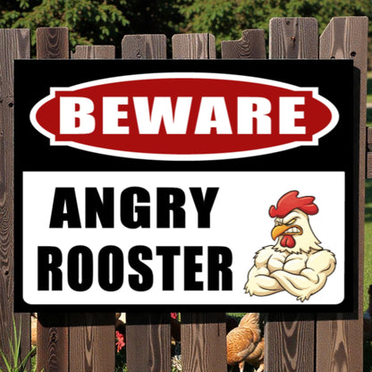 Warning sign with cartoon rooster and text 'Beware Angry Rooster' on a wooden fence background
