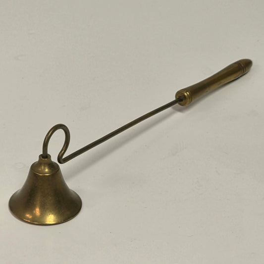 Antique solid brass candle snuffer with threaded handle and original patina.
