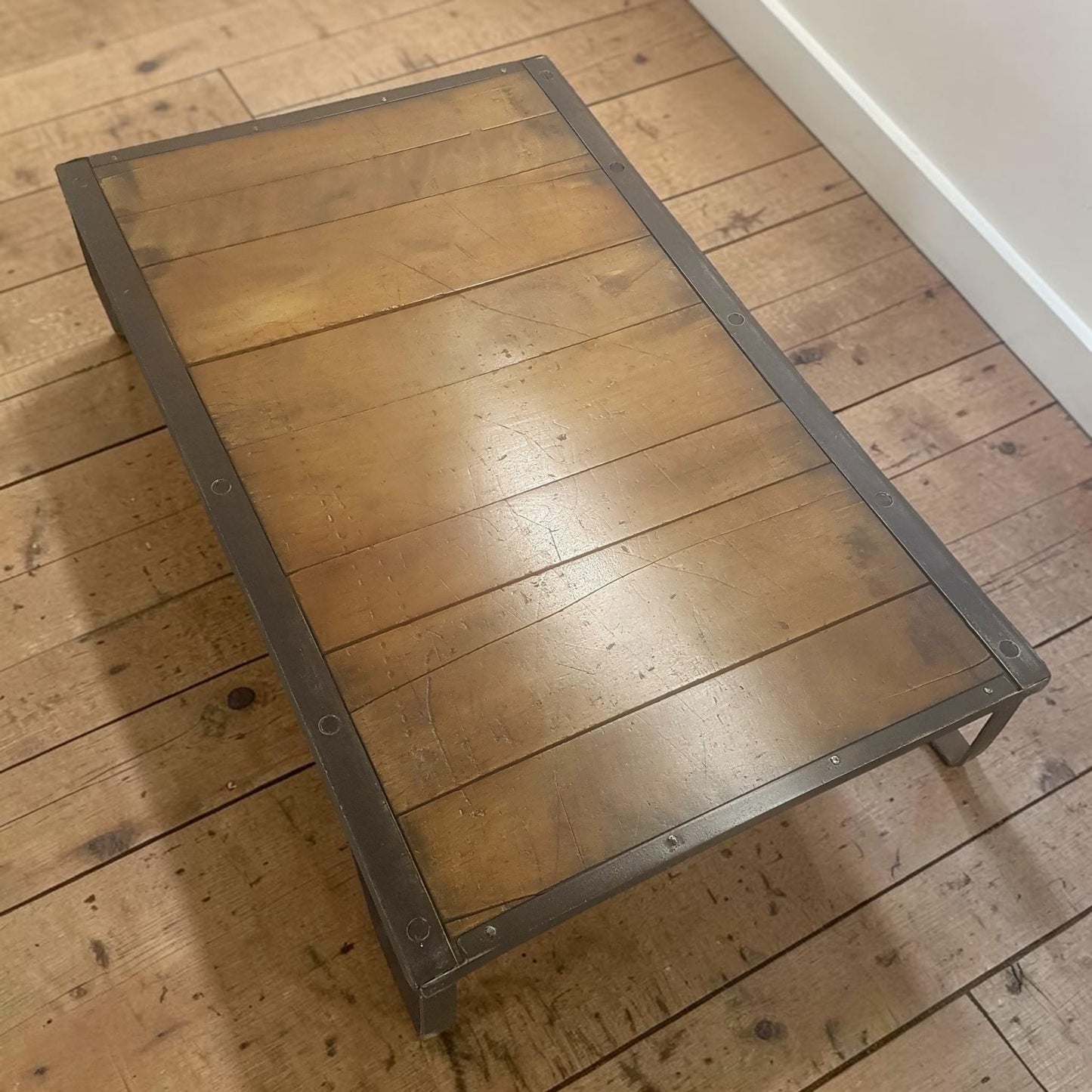 Authentic industrial factory pallet in wood and iron, perfect for coffee table or custom bar table conversion.