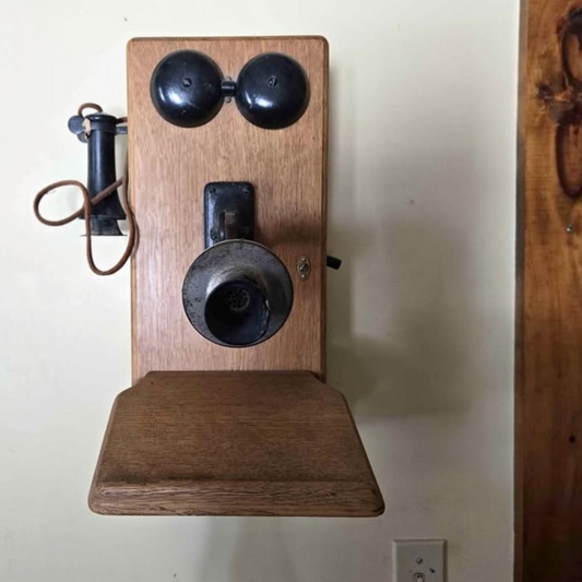 Antique 1915 oak wall telephone with beautiful original country charm.