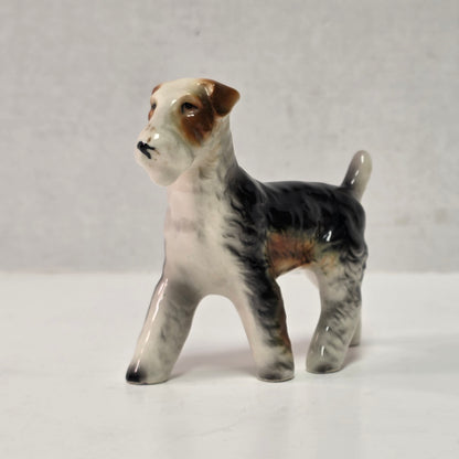 Antique hand-painted porcelain wire-haired terrier dog figurines
