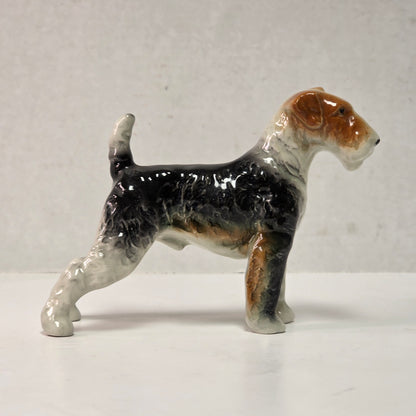 Antique hand-painted porcelain wire-haired terrier dog figurines

