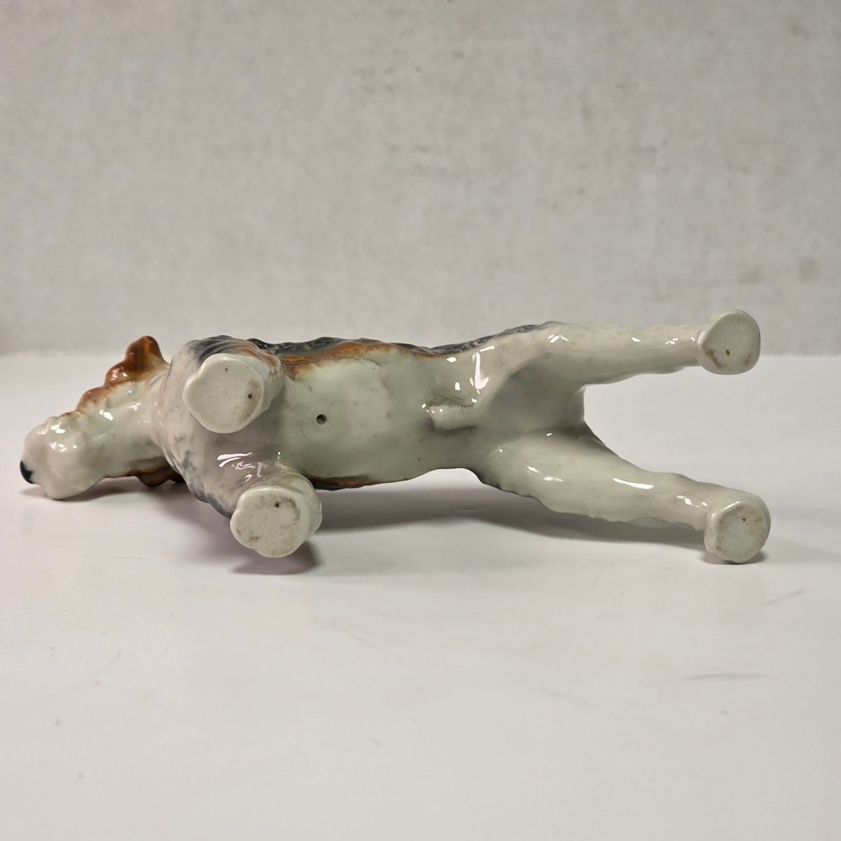 Antique hand-painted porcelain wire-haired terrier dog figurines
