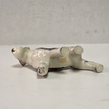 Antique hand-painted porcelain wire-haired terrier dog figurines
