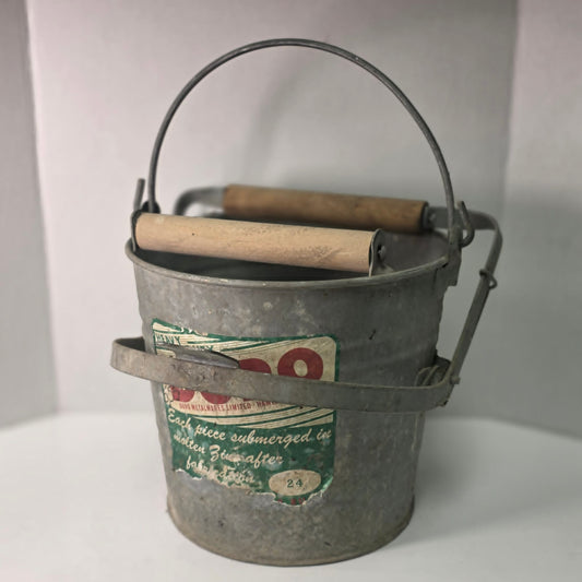 Antique Duro No. 24 galvanized wringer bucket with original label and price marking.