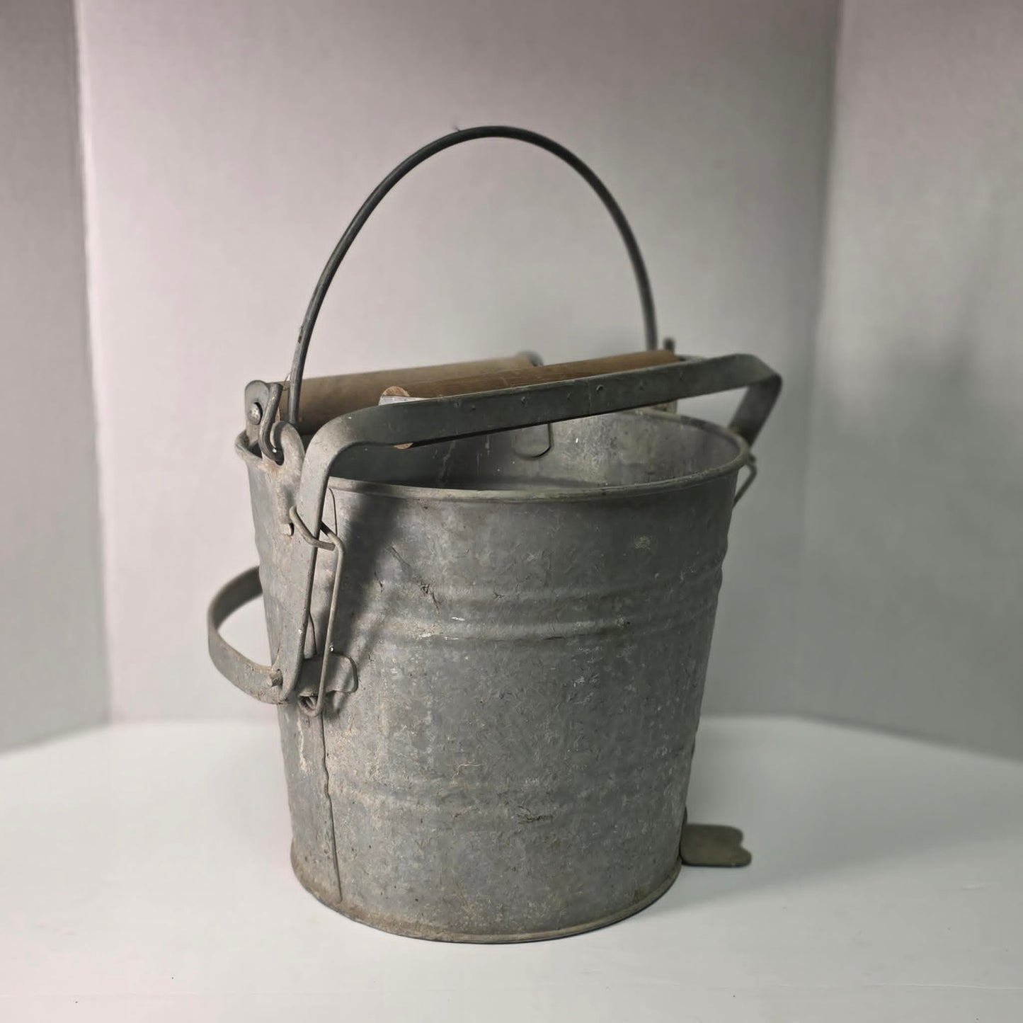 Antique Duro No. 24 galvanized wringer bucket with original label and price marking.