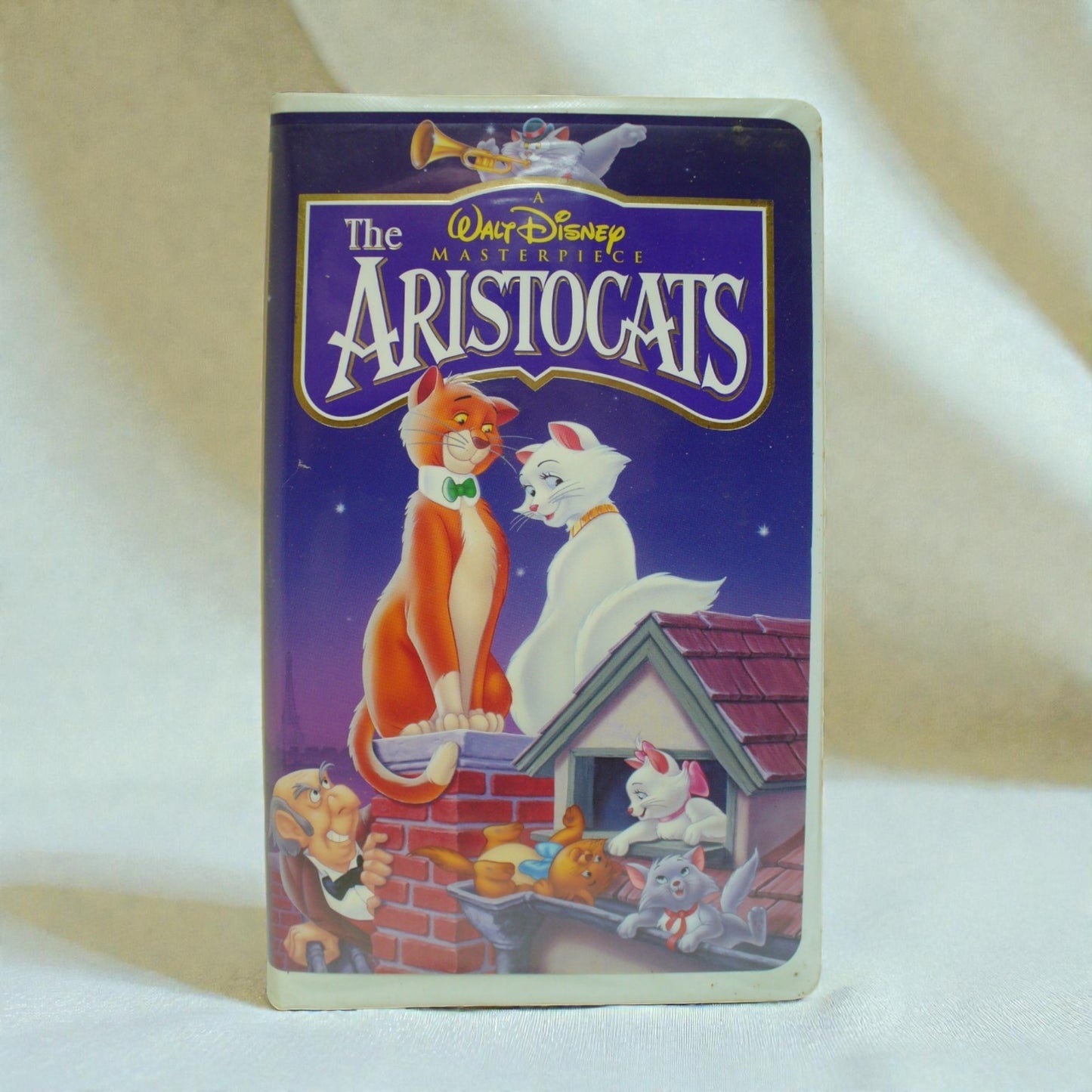 VHS tape of 'The Aristocats' with cartoon characters on a white background