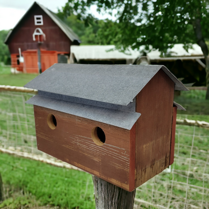 handcrafted barn shaped birdhouse 