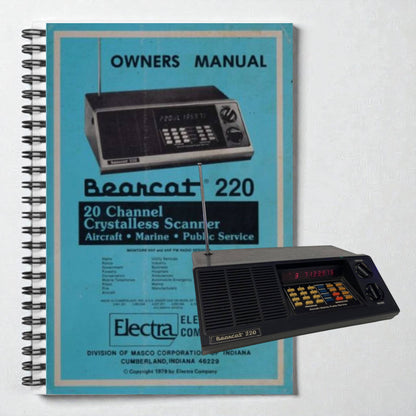 Vintage Bearcat 220 scanner with its owner's manual on a light gray background